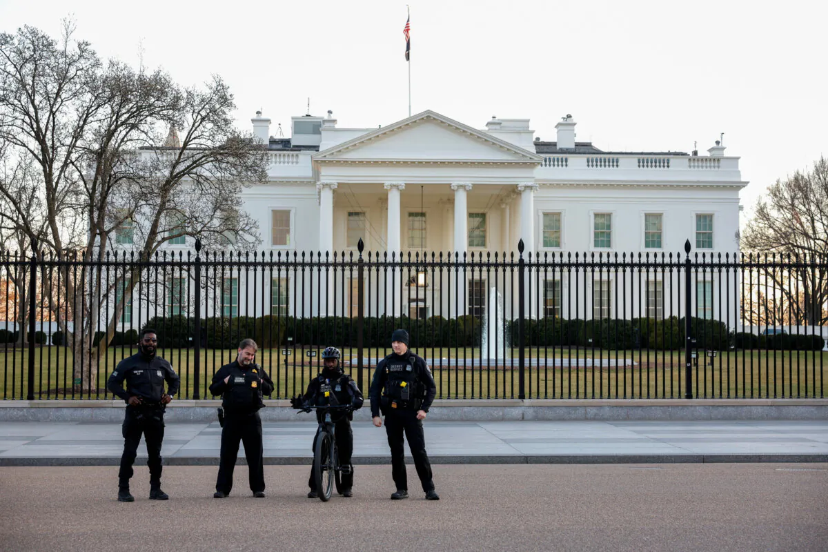 Secret Service police stand guard outside the White House on Jan. 28, 2023. (Tasos Katopodis/Reuters)