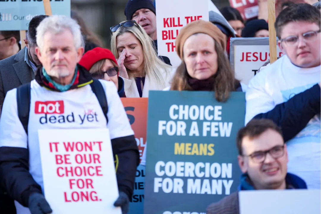 People take part in a demonstration to oppose the Terminally Ill Adults Bill at Old Palace Yard in Westminster, London, on Nov. 29, 2024. (Yui Mok/PA Wire)