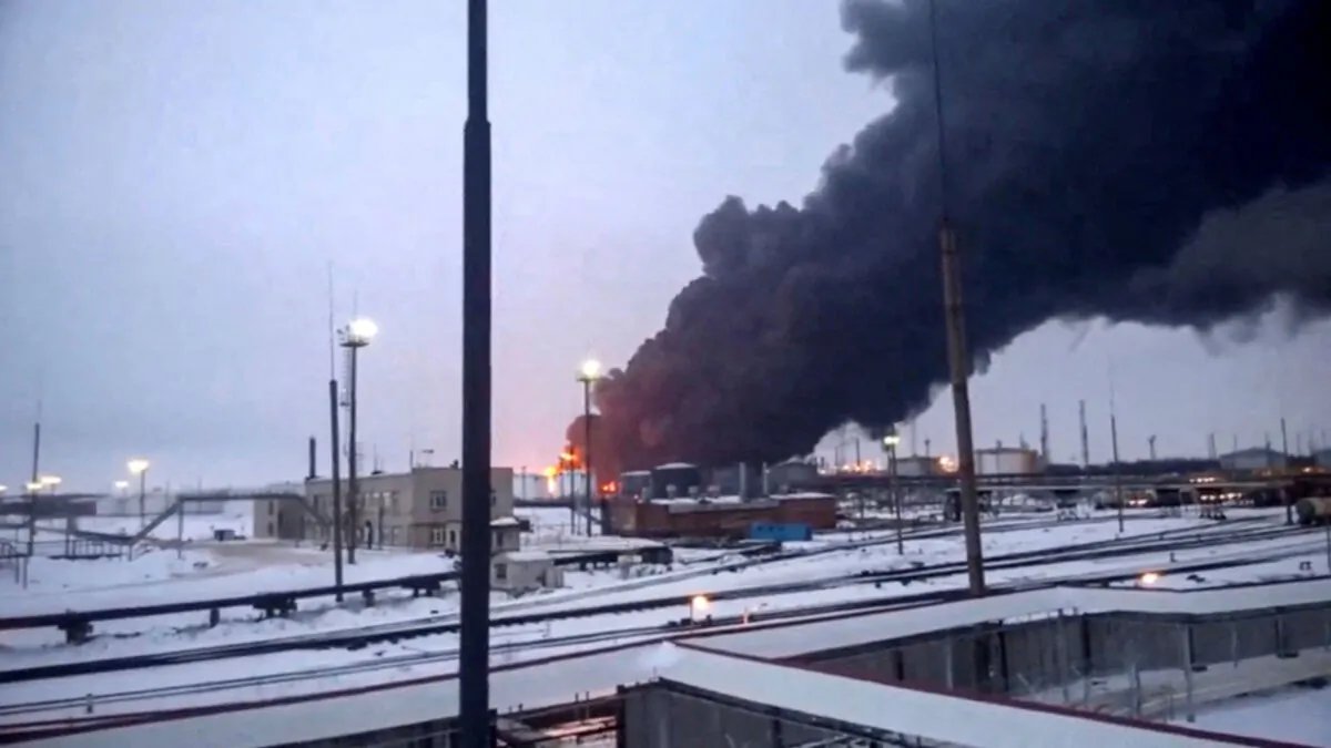 In this screen grab from a video, smoke billows from a fire after Ukraine's SBU drone strikes a refinery, in Ryazan region, Russia, on March 13, 2024. (Video Obtained By Reuters/via Reuters)
