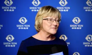 Audience Member Transfixed by Heavenly Scenes in Shen Yun