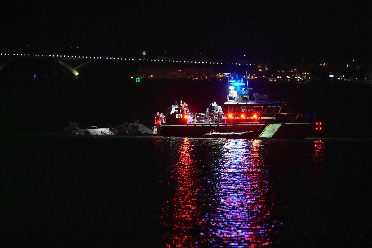 Emergency response units respond to helicopter wreckage in the Potomac River near Ronald Reagan Washington Airport in Arlington, Va., on Jan. 29, 2025. (Andrew Harnik/Getty Images)