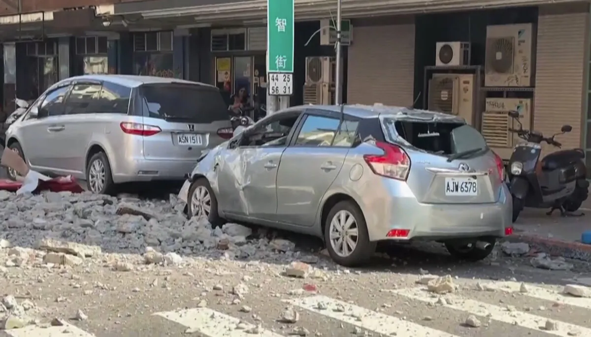 This image made from video shows damaged cars in Tainan, Taiwan, on Jan. 30, 2025, following an earthquake. (TVBS via AP)
