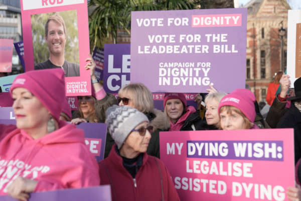 People take part in a demonstration organised by campaign group Dignity in Dying outside the Houses of Parliament in support of the Terminally Ill Adults (End of Life) Bill in Westminster, London, England, on Nov. 29, 2024. (Stefan Rousseau/PA Wire)