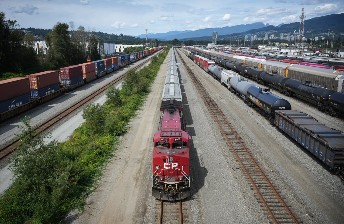 A locomotive moves rail cars at the Canadian Pacific Kansas City (CPKC) rail yard in Port Coquitlam, B.C., on Aug. 19, 2024. (The Canadian Press/Darryl Dyck)