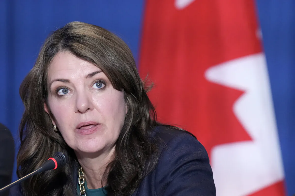 Alberta Premier Danielle Smith speaks to the media during the fall meetings of Canada's premiers hosted by Ontario in Toronto, on Dec. 16, 2024. (The Canadian Press/Nathan Denette) 