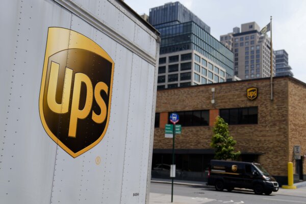 UPS to Slash Package Deliveries for Amazon