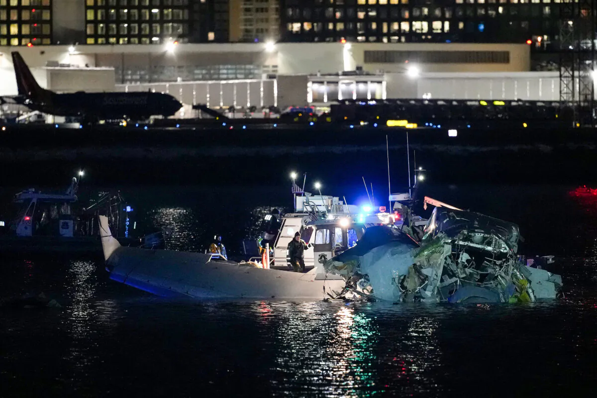 Emergency response units assess airplane wreckage in the Potomac River near Ronald Reagan Washington Airport in Arlington, Va., on Jan. 30, 2025. (Andrew Harnik/Getty Images)