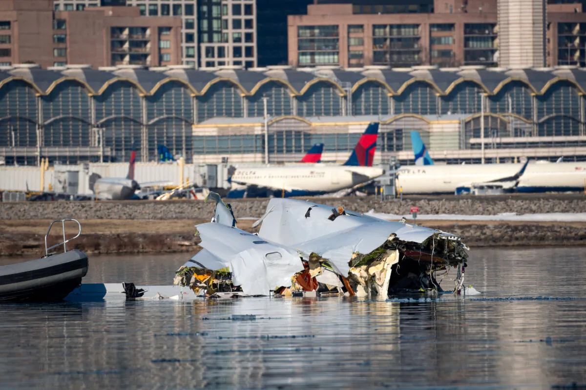 The U.S. Coast Guard investigates aircraft wreckage after a midair collision over the Potomac River near Washington, on Jan. 30, 2025. (Brandon Giles/ U.S. Coast Guard via Getty Images)