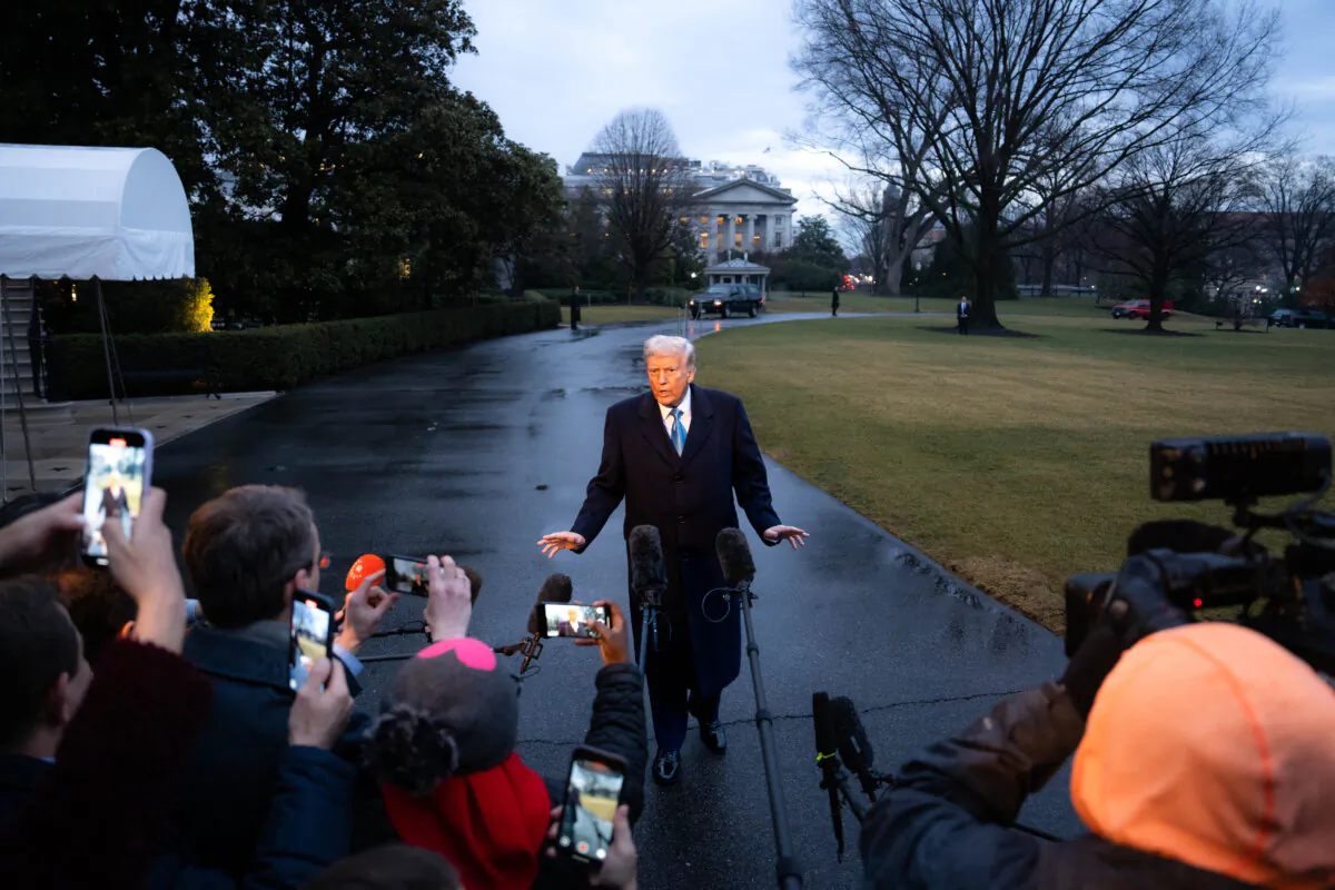 President Donald Trump speaks to reporters as he departs the White House en route to Joint Base Andrews in Washington on Jan. 31, 2025. (Madalina Vasiliu/The Epoch Times)