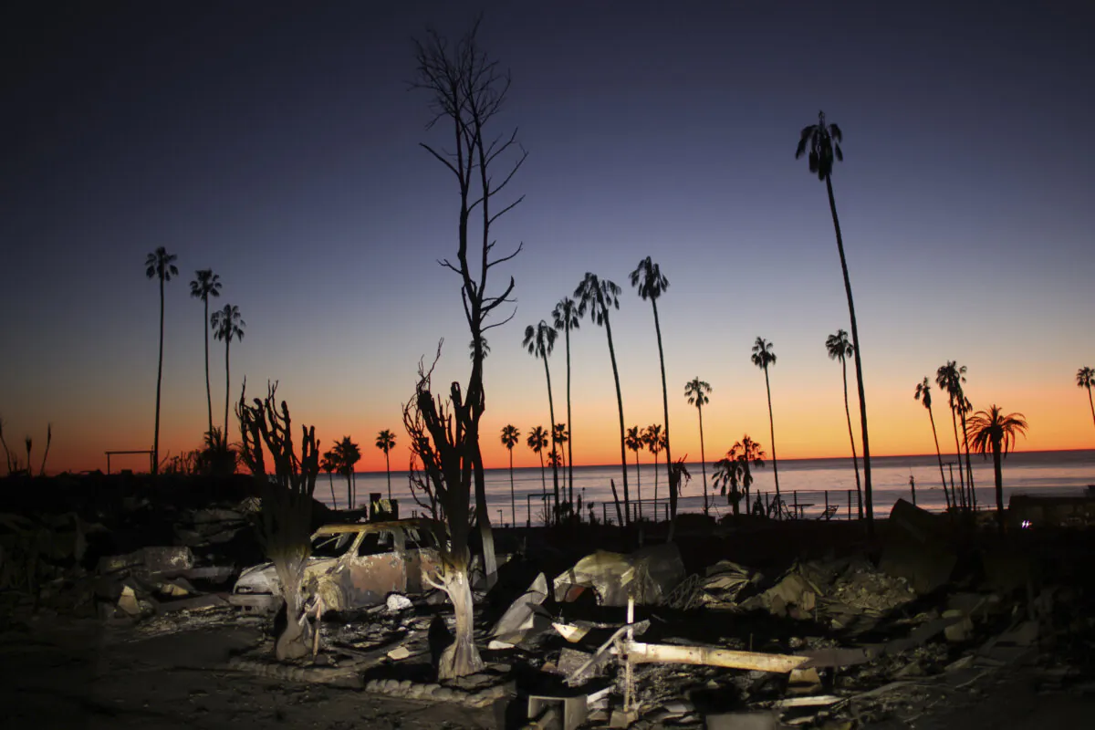 The devastation of the Palisades Fire is seen at sunset in the Pacific Palisades neighborhood of Los Angeles on Jan. 14. (Ethan Swope/AP Photo)
