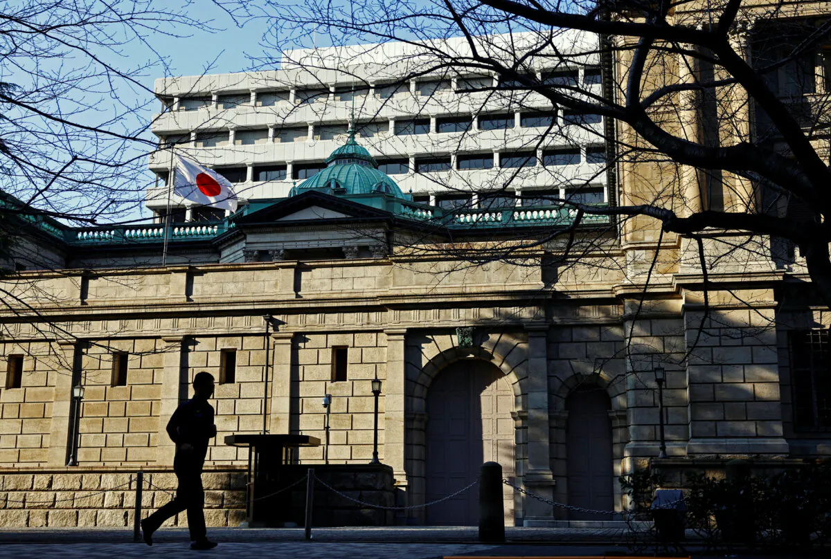 A passerby walks past the Bank of Japan headquarters in Tokyo, Japan, on Jan. 23, 2025. (Issei Kato/Reuters)