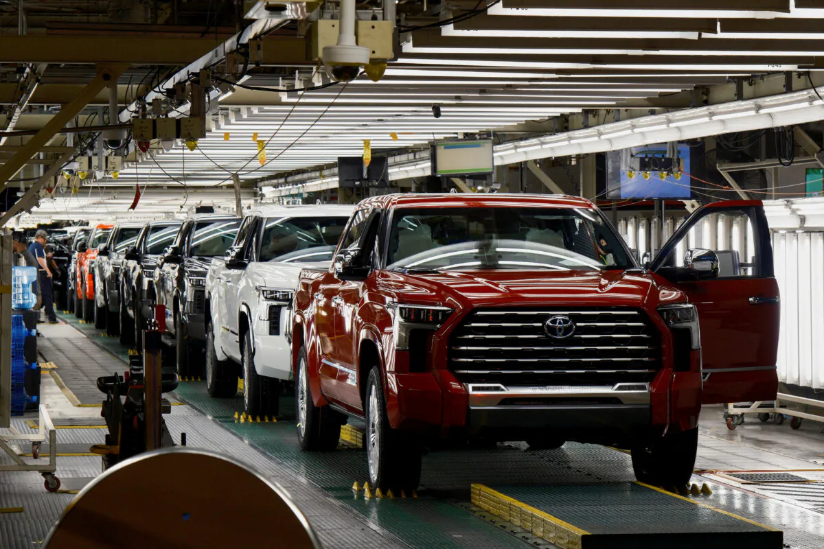 Tundra trucks and Sequoia SUVs exit the assembly line as finished products at Toyota's truck plant in San Antonio, Texas, on April 17, 2023. (Reuters/Jordan Vonderhaar)