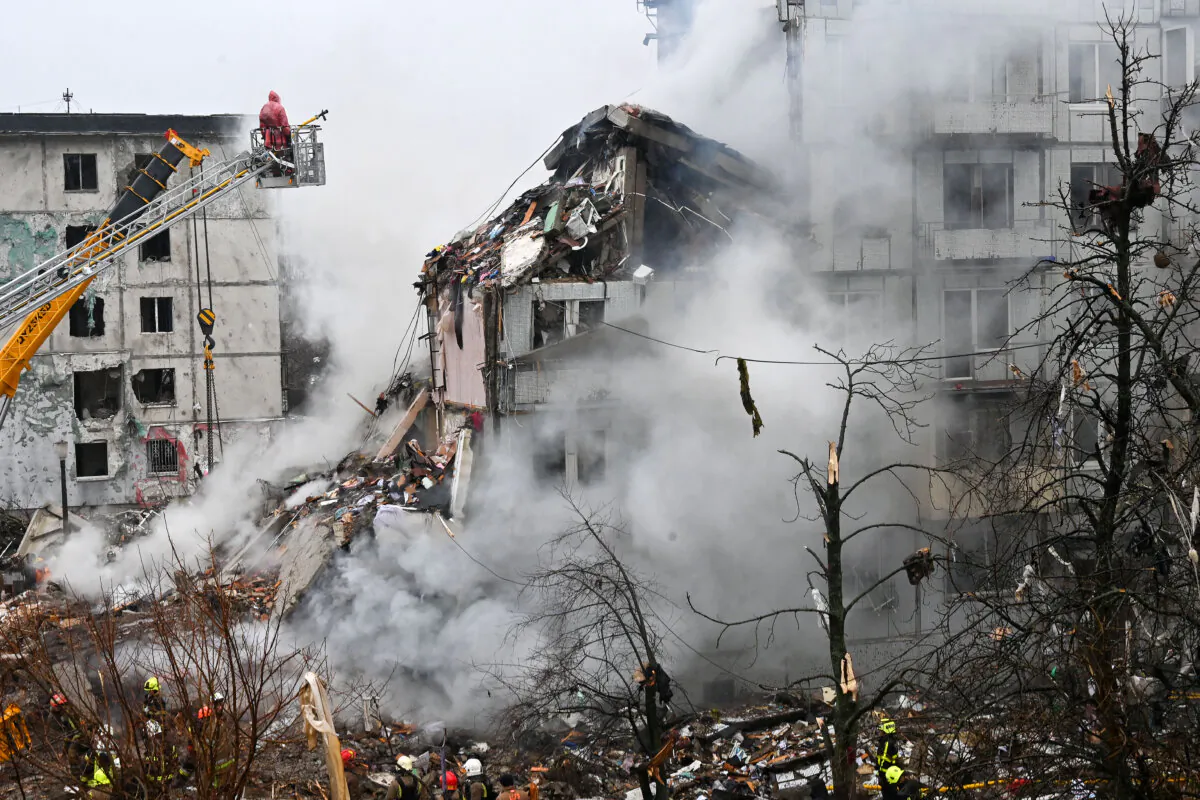 A firefighter inspects the rubble of a damaged residential building following a missile strike in Poltava, Ukraine, on Feb. 1, 2025, amid the Russian invasion of Ukraine. (SERGEY BOBOK/AFP via Getty Images)