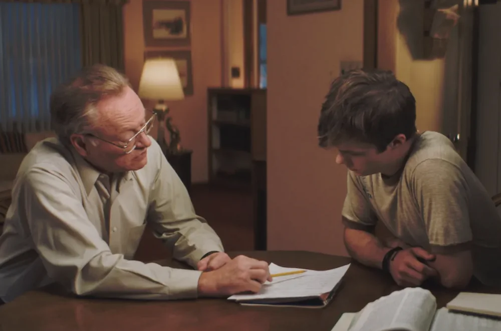 Stan (Jared Harris, L) and Nathan Williams (Nicholas Hamilton) are teacher and student, in "Brave the Dark." (Angel Studios)
