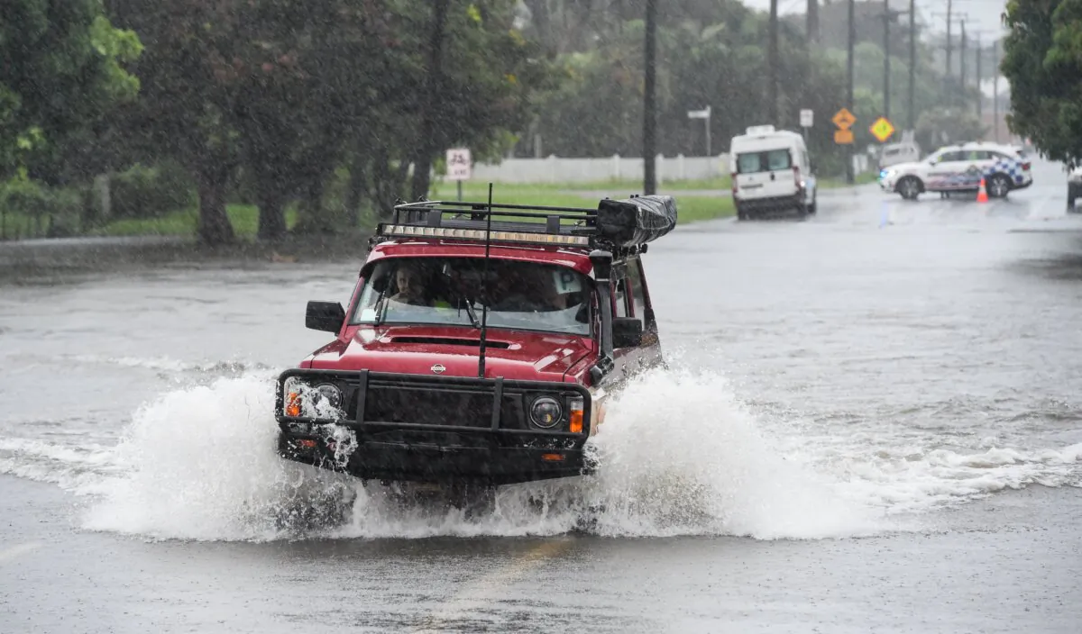 Floodwaters on Townsend St, Mysterton in Townsville, Australia, on Jan. 31, 2025. (AAP Image/Scott Radford-Chisholm)