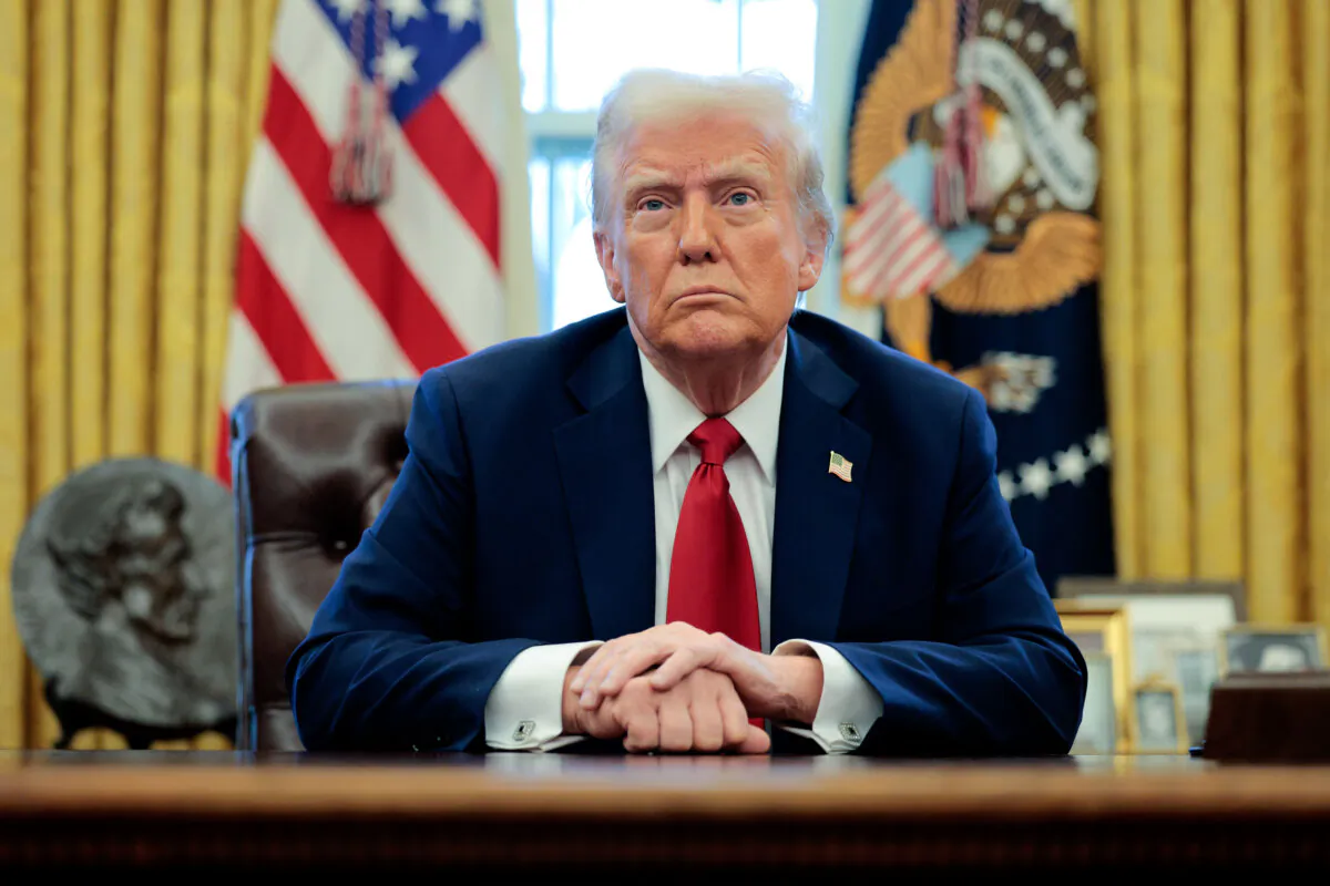 President Donald Trump talks to reporters in the Oval Office at the White House on Jan. 30, 2025. (Chip Somodevilla/Getty Images)