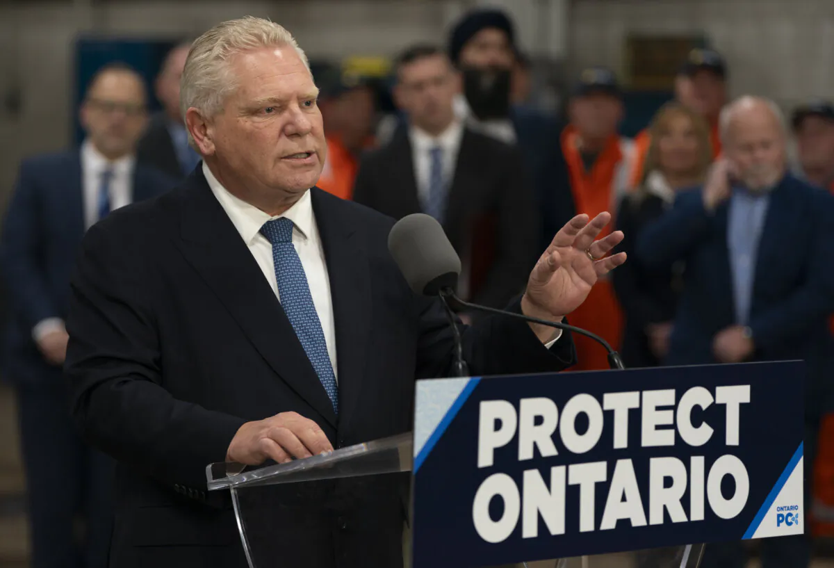 Progressive Conservative Leader Doug Ford speaks from the podium during a visit to Walker Construction in St. Catharines, Ont. on Jan. 31, 2025. (The Canadian Press/Peter Power)