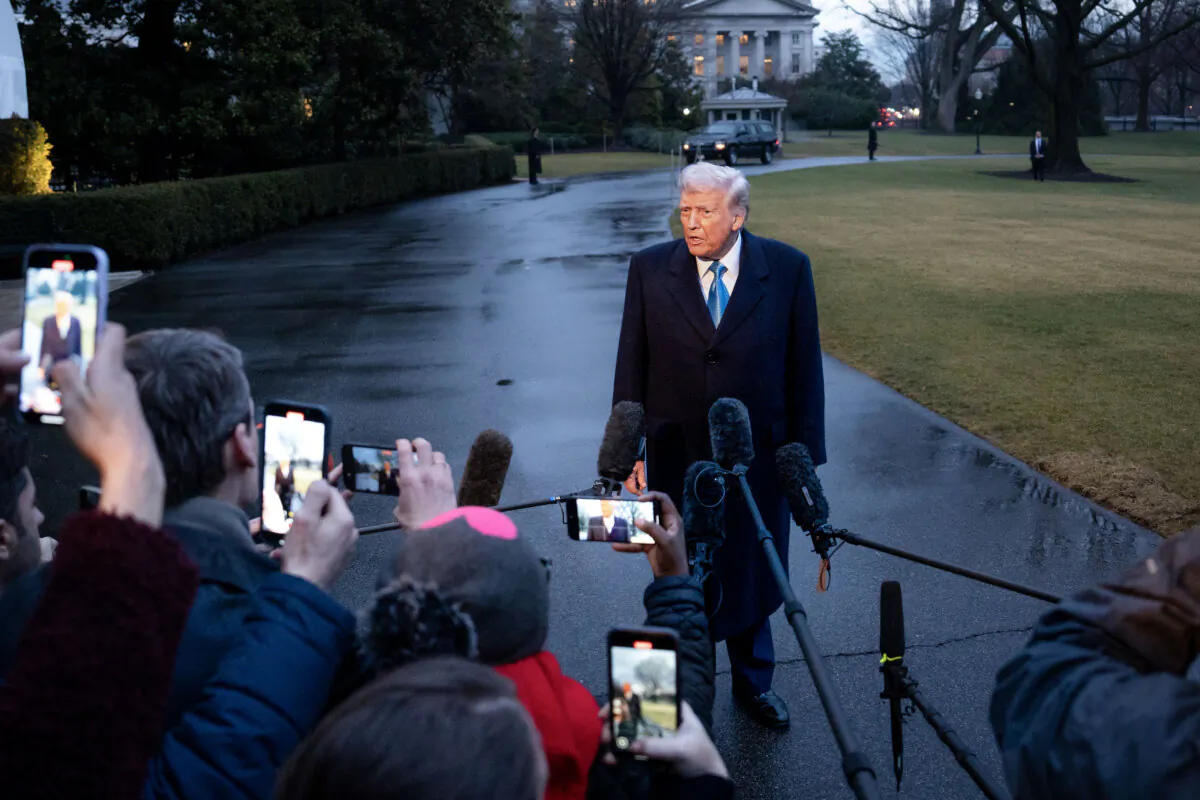 President Donald Trump speaks to reporters as he departs the White House on Jan. 31, 2025.(Madalina Vasiliu/The Epoch Times)