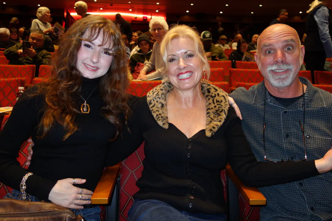 Sabella Hamlet (L) with her parents at the Shen Yun Performing Arts performance at SAFE Credit Union Performing Arts Center on Feb. 2, 2025. (Lily Yu/The Epoch Times)