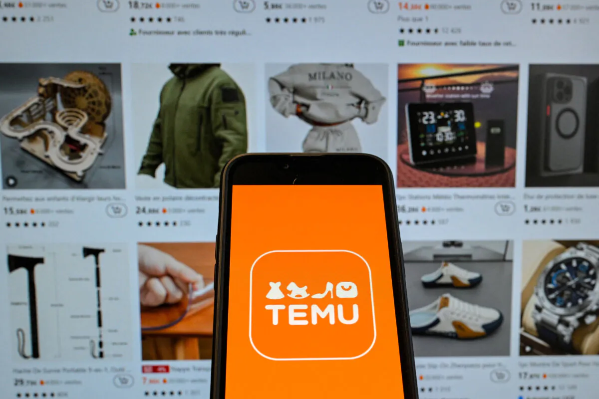 Chinese e-commerce company Temu displayed on a mobile phone in front the company's website, in Brussels, on Nov. 4, 2024. (Nicolas Tucat/AFP via Getty Images)