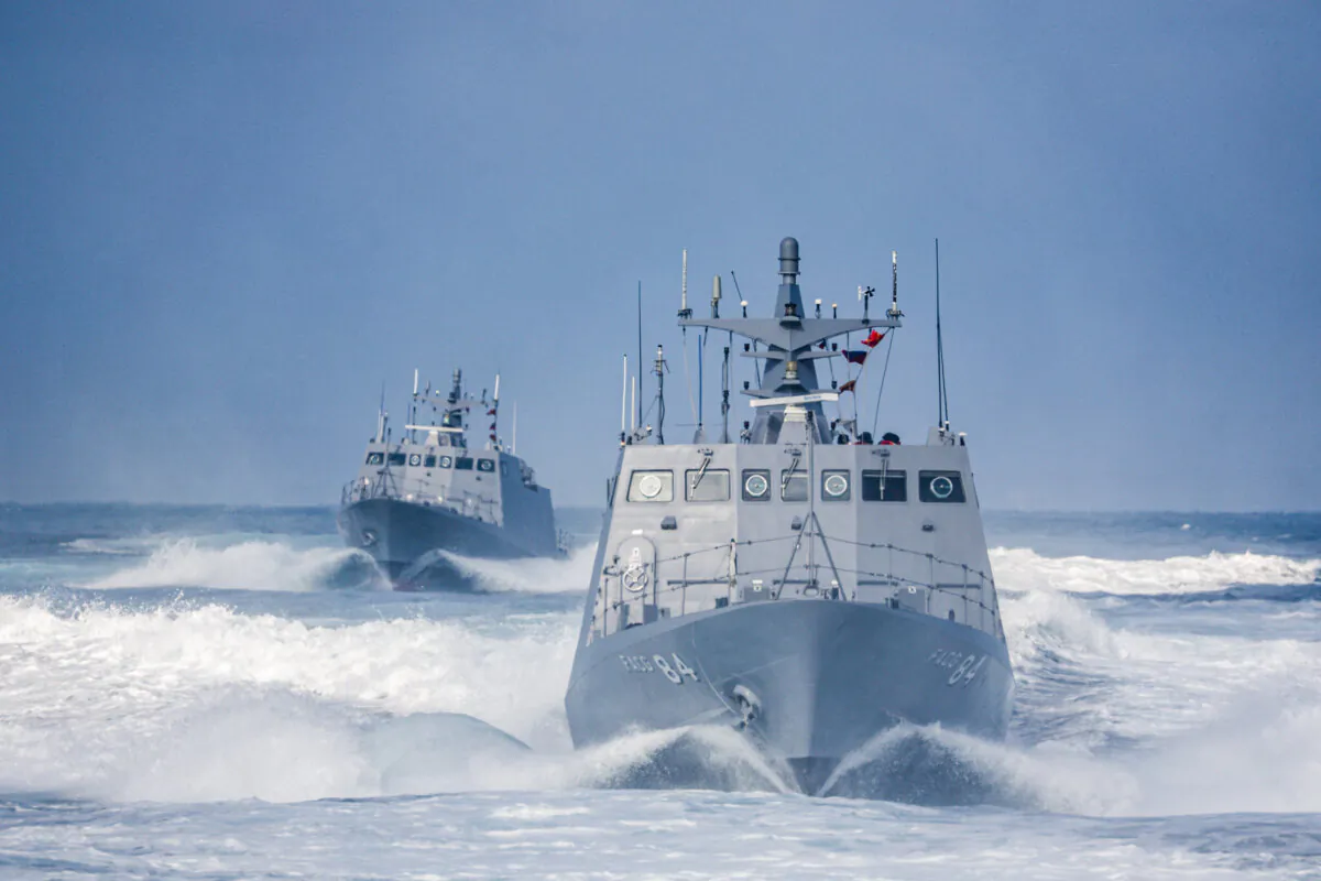 Two KH-6 fast attack missile boats sail in formation during a combat readiness exercise at the Zuoying Naval Base in Kaohsiung, Taiwan, on Jan. 9, 2025. (I-Hwa Cheng/AFP via Getty Images)