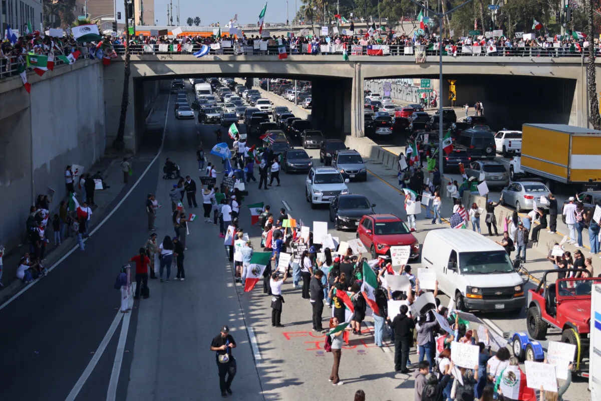 Protesters block the 101 Freeway during a demonstration opposed to President Donald Trump's policies on illegal immigration in Los Angeles on Feb. 2, 2025. (David Swanson/AFP via Getty Images)