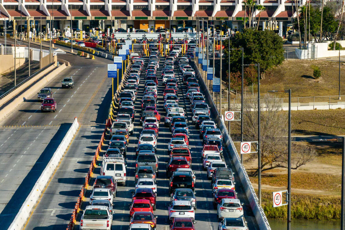 Vehicles sit in traffic while waiting to cross the U.S.–Mexico border in Laredo, Texas, on Feb. 3, 2025. (Brandon Bell/Getty Images)