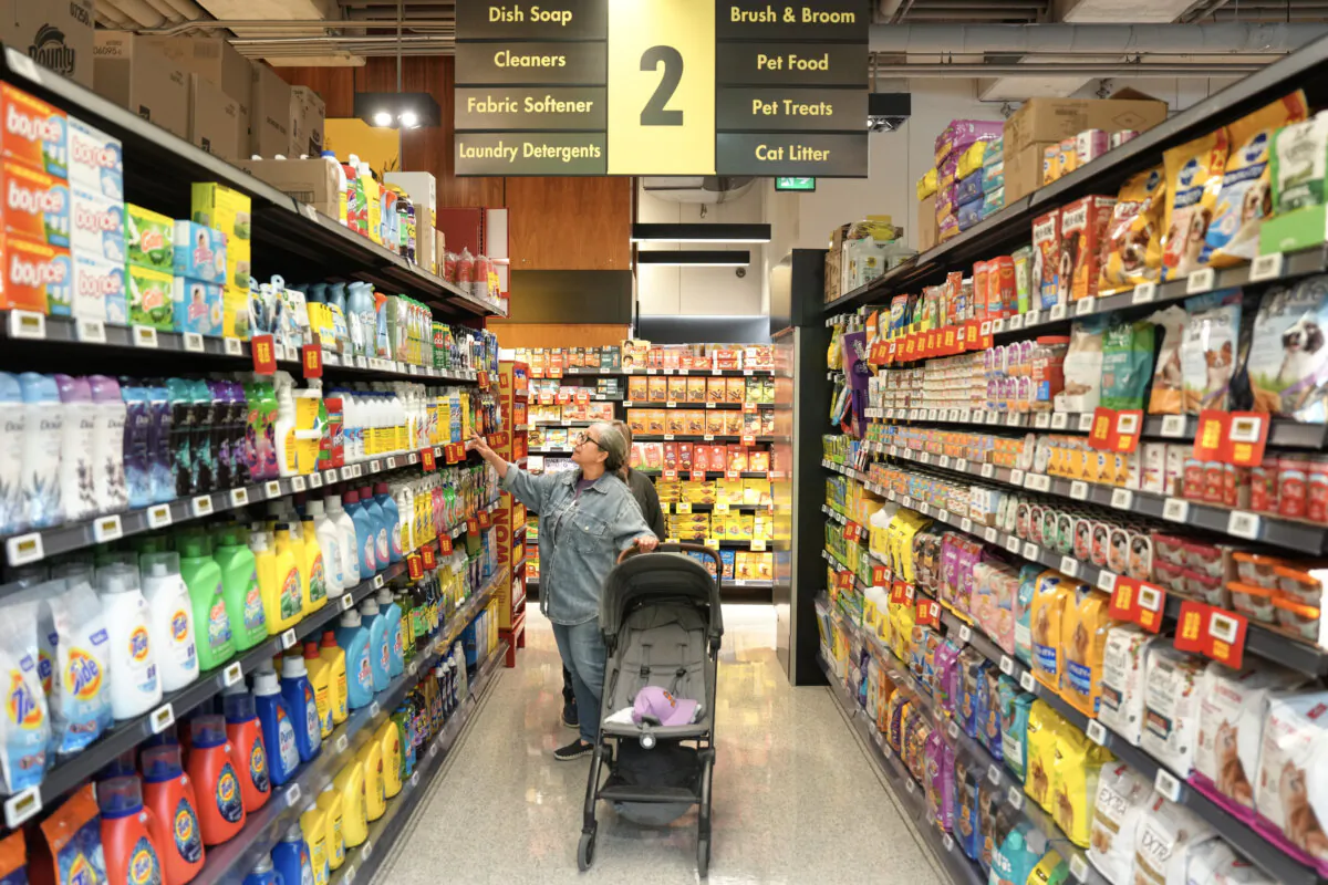 A customer shops in a new "small format" No Frills grocery store that the grocery chain is testing, in Toronto, on May 30, 2024. (The Canadian Press/Chris Young)