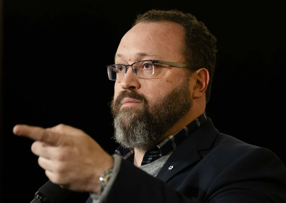 President of the Automotive Parts Manufacturers’ Association Flavio Volpe speaks to the media at the federal cabinet retreat in Montreal, on Jan. 23, 2024. (The Canadian Press/Christinne Muschi)