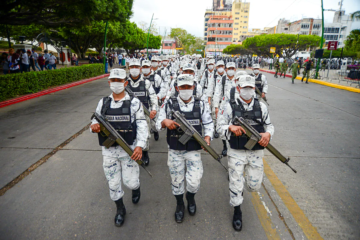 Members of the National Guard march during the announcement of the new measures by the Mexican government to deter illegal crossings at the southern border with Guatemala, in Tuxtla Gutierrez, Mexico on March 19, 2021. (Jacob Garcia/Reuters)