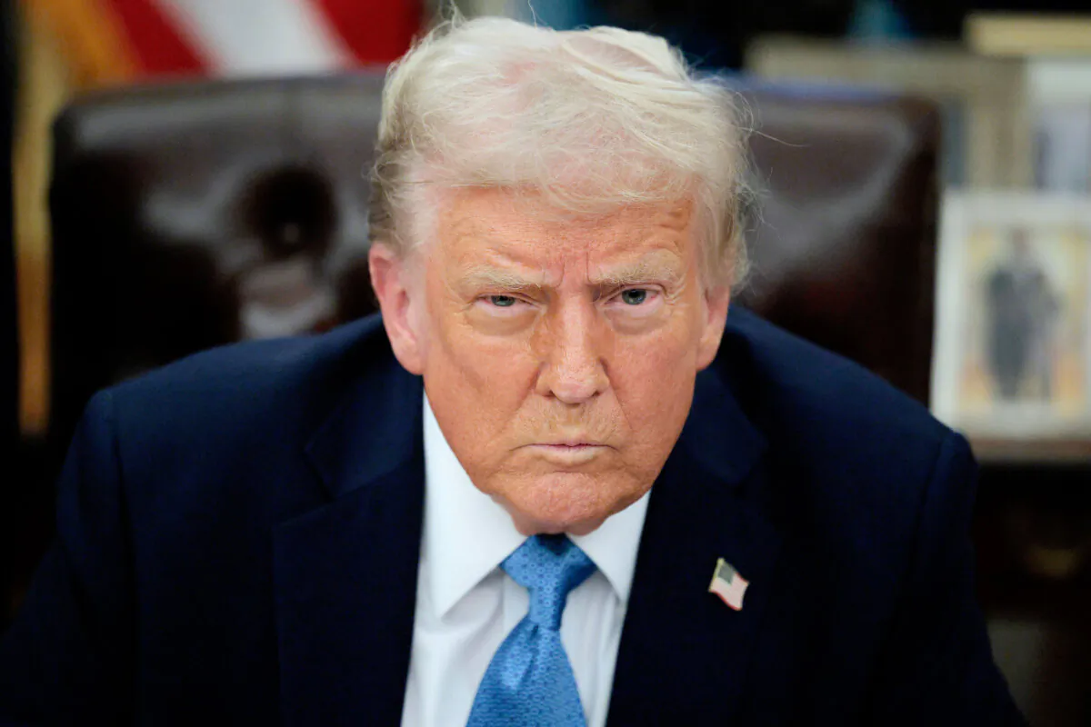 President Donald Trump talks to reporters after signing an executive order, "Unleashing Prosperity Through Deregulation," in the Oval Office on Jan. 31, 2025. (Chip Somodevilla/Getty Images)