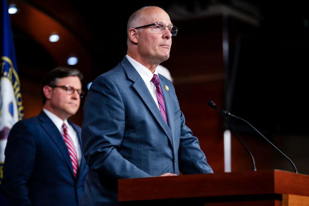 House Speaker Mike Johnson (R-La.) (L) and Rep. John Moolenaar (R-Mich.) (R), chairman of the Select Committee on the Chinese Communist Party, during a press conference at the Capitol on Sept. 10, 2024. (Kent Nishimura/Getty Images)