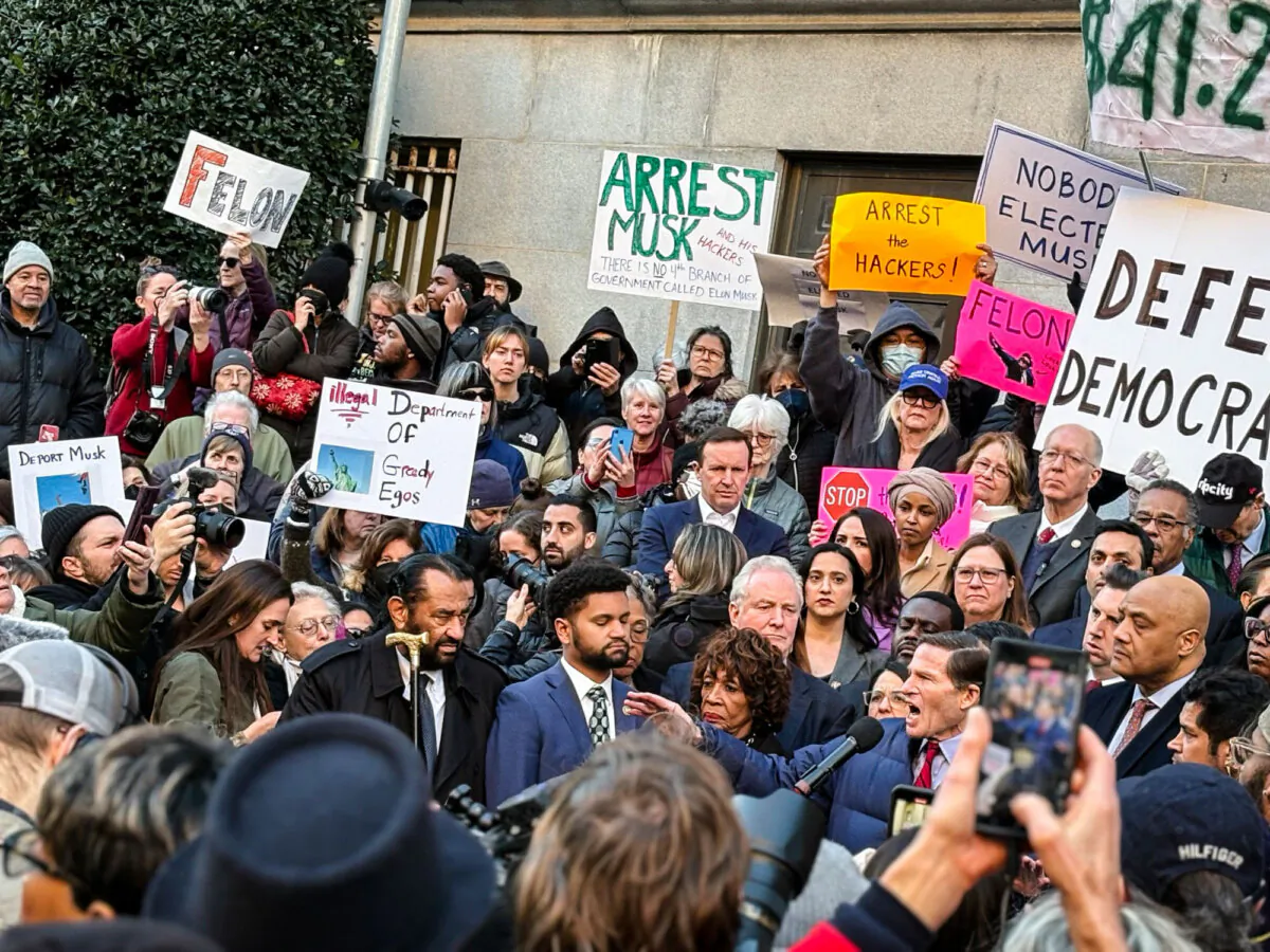 Congressional Democrats protest DOGE's access to payment data outside the Treasury Building in Washington, on Feb. 4, 2025. (Nathan Worcester/The Epoch Times)