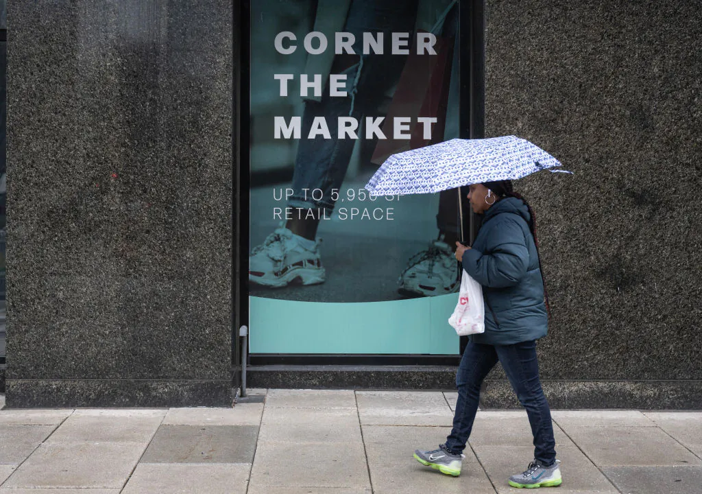 A person walks past a building with retail space for rent in Washington on March 6, 2024. (Andrew Caballero-Reynolds/AFP via Getty Images)
