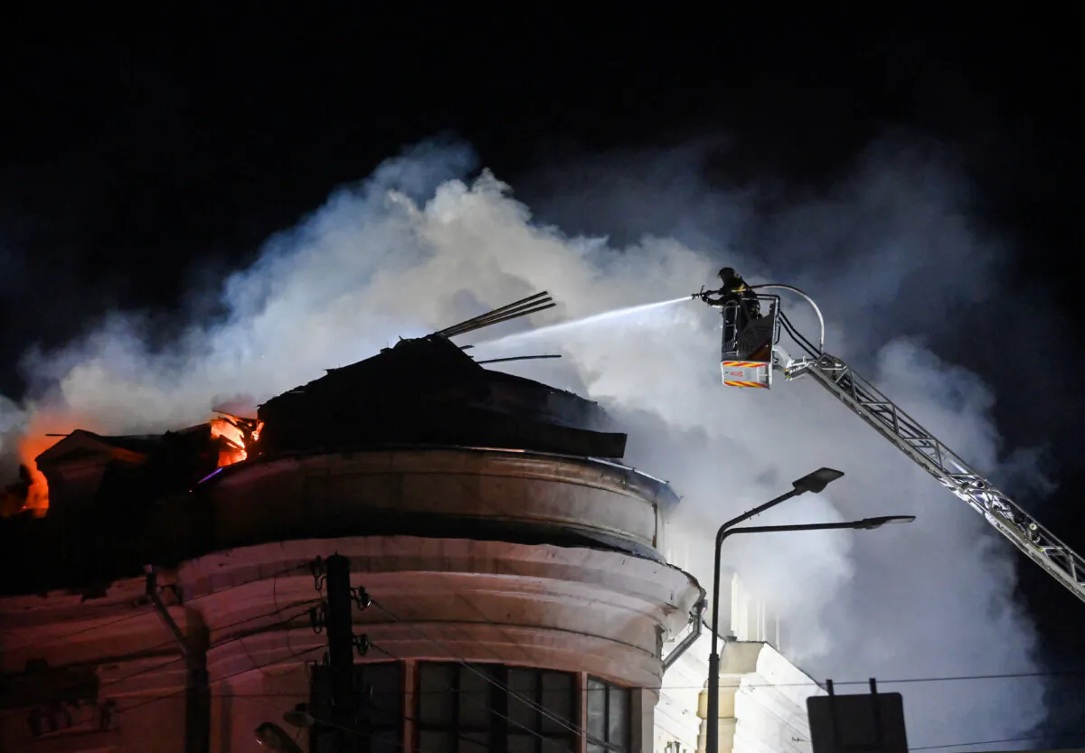 Ukrainian firefighters try to put out a fire after a drone strike in Kharkiv, Ukraine, on Feb. 5, 2025. (Sergey Bobok/AFP via Getty Images)