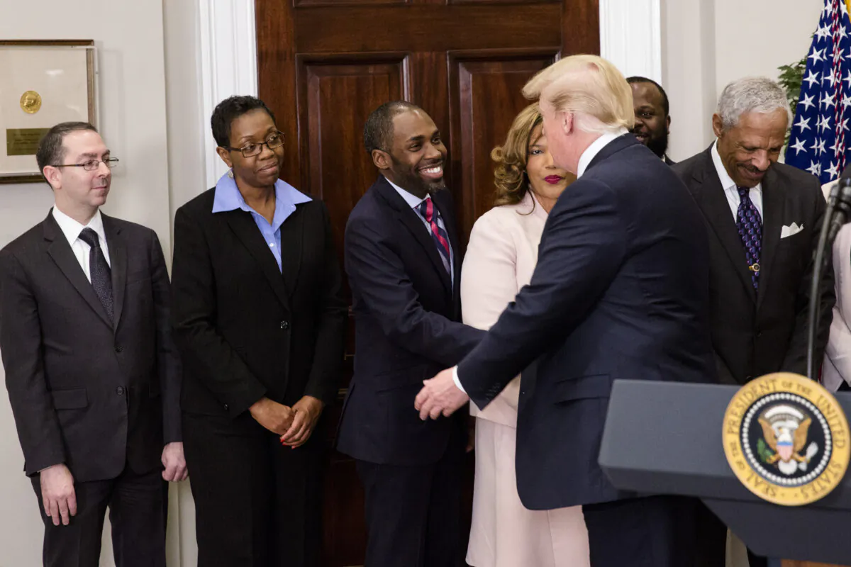 President Donald Trump announces Johnny Taylor Jr. as the chairman of the President’s Board of Advisors on Historically Black Colleges and Universities in the Roosevelt Room of the White House on Feb. 27, 2018. (Samira Bouaou/The Epoch Times)