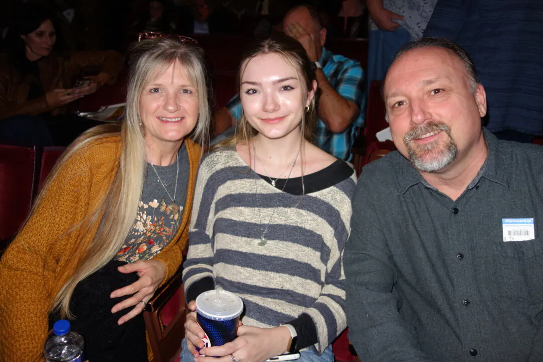 Kimberly McAllister, Sophia McAllister, and Joe McAllister at the Shen Yun Performing Arts performance at William Saroyan Theatre on Feb. 4, 2025. (Lily Yu/The Epoch Times)