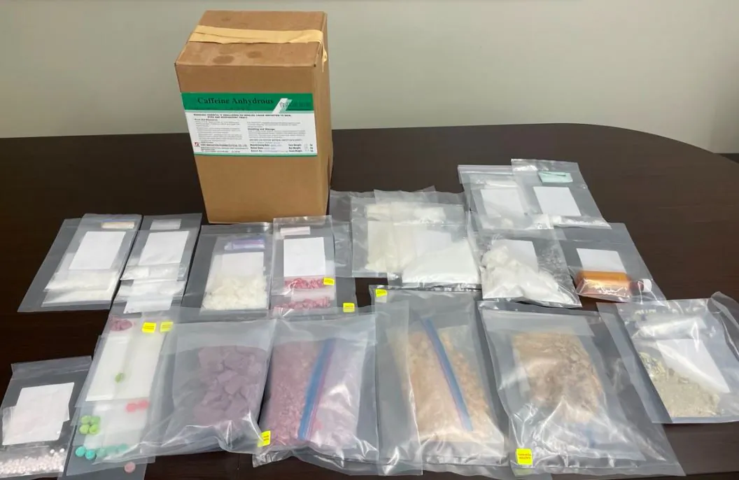 Picture of drugs and drug production materials seized by the Edmonton Police Service in November 2024. (Handout photo)