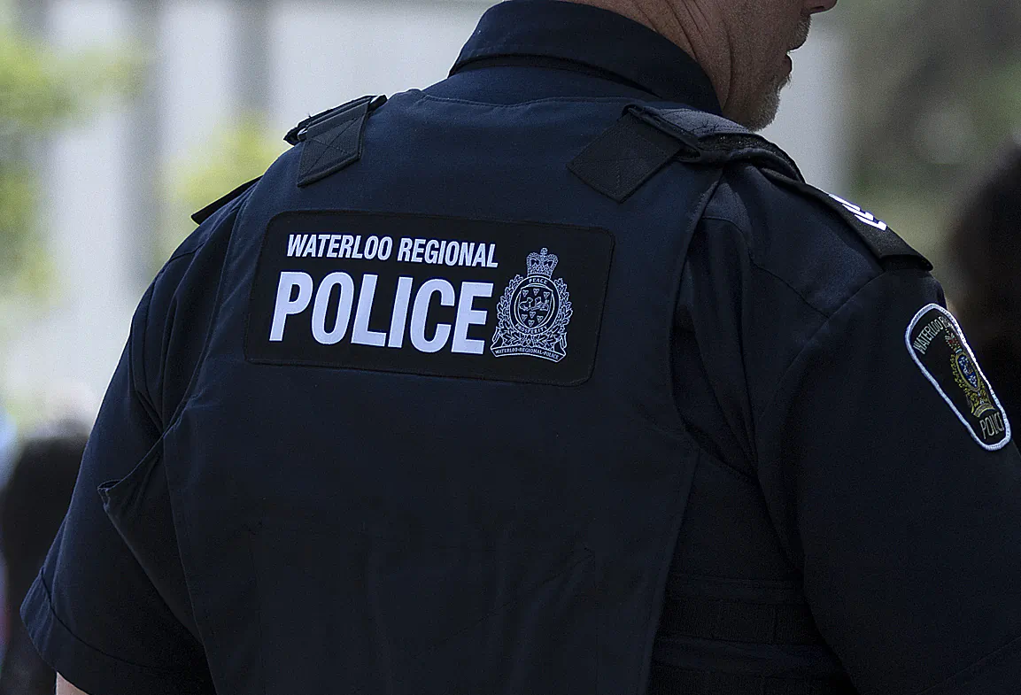 A Waterloo Regional Police officer looks on during an event in Waterloo, Ont., on, June 29, 2023. (The Canadian Press/Nicole Osborne)