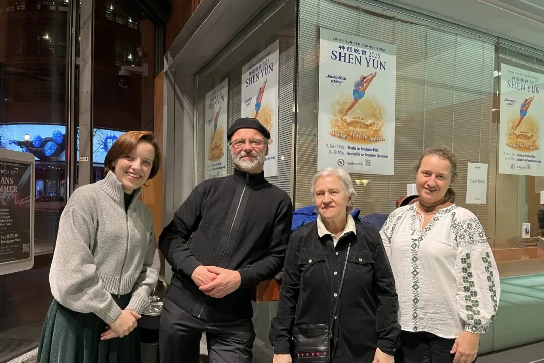 Choir director Cornelia Knoch (L) and her family enjoyed Shen Yun at the Theater am Potsdamer Platz in Berlin on the evening of Jan. 31, 2025. (The Epoch Times)