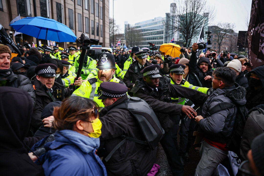 NextImg:Day in Photos: Protest Against Chinese Embassy, Border Closure in Ecuador, and Dogs Flyball Tournament