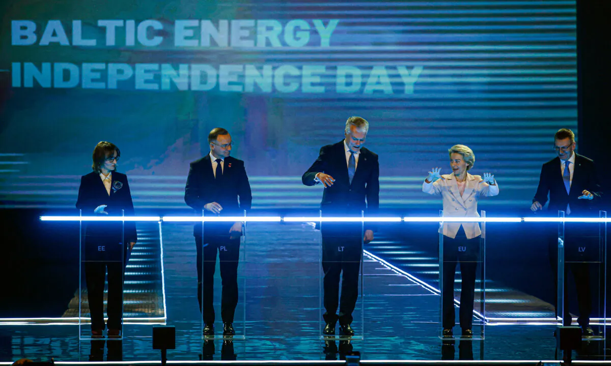 (L-R) Estonian Minister of Climate Yoko Alender, Polish President Andrzej Duda, Lithuanian President Gitanas Nauseda, European Commission President Ursula von der Leyen, and Latvian President Edgars Rinkevics stand behind lights symbolizing the Baltic states disconnecting from the Moscow-controlled energy grid and joining the European power grid at the event "Baltic Energy Independence Day" at the Litexpo Exhibition Center in Vilnius, Lithuania, on Feb 9, 2025. European Commission President Ursula von der Leyen on Feb. 9 said ending Baltic power links to Russia marked "freedom from threats and blackmail" as Estonia, Latvia, and Lithuania joined the EU power grid. (Petras Malukas/AFP via Getty Images)