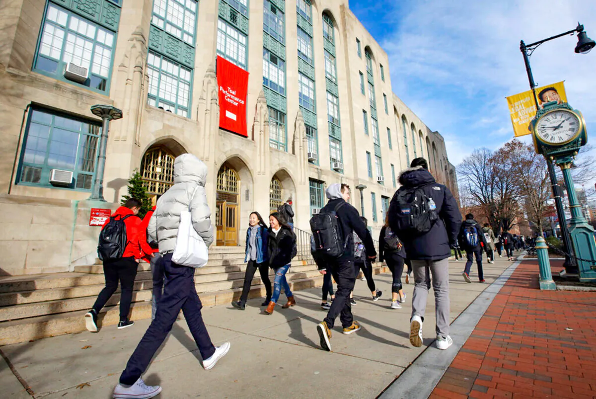 Students walk on the campus of Boston University in Boston in a file photo. (Steven Senne/AP Photo)