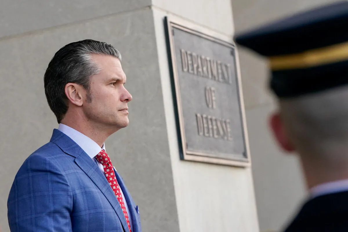 Defense Secretary Pete Hegseth prepares to welcome Australian Defense Minister and Deputy Prime Minister Richard Marles at the Pentagon in Arlington, Va., on Feb. 7, 2025. (Nathan Howard/Reuters)