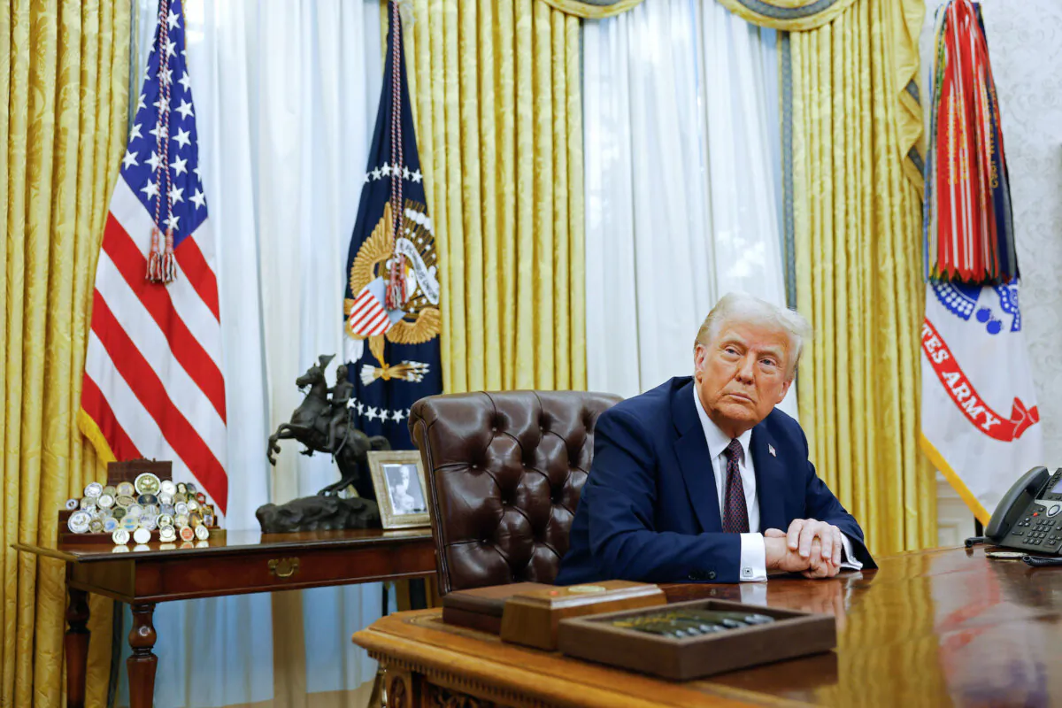 U.S. President Donald Trump speaks to reporters after signing a series of executive orders in the Oval Office of the White House in Washington on Jan. 23, 2025. (Anna Moneymaker/Getty Images)