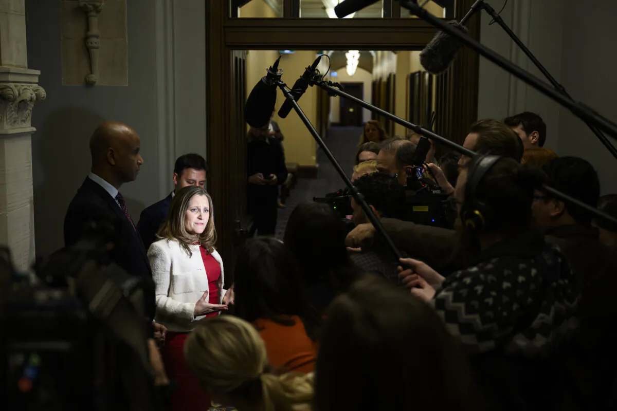 Liberal MP Chrystia Freeland, candidate for the leadership of the Liberal Party of Canada, answers questions from journalists on her way to a caucus meeting in West Block on Parliament Hill, in Ottawa, on Jan. 23, 2025. (The Canadian Press/Justin Tang)