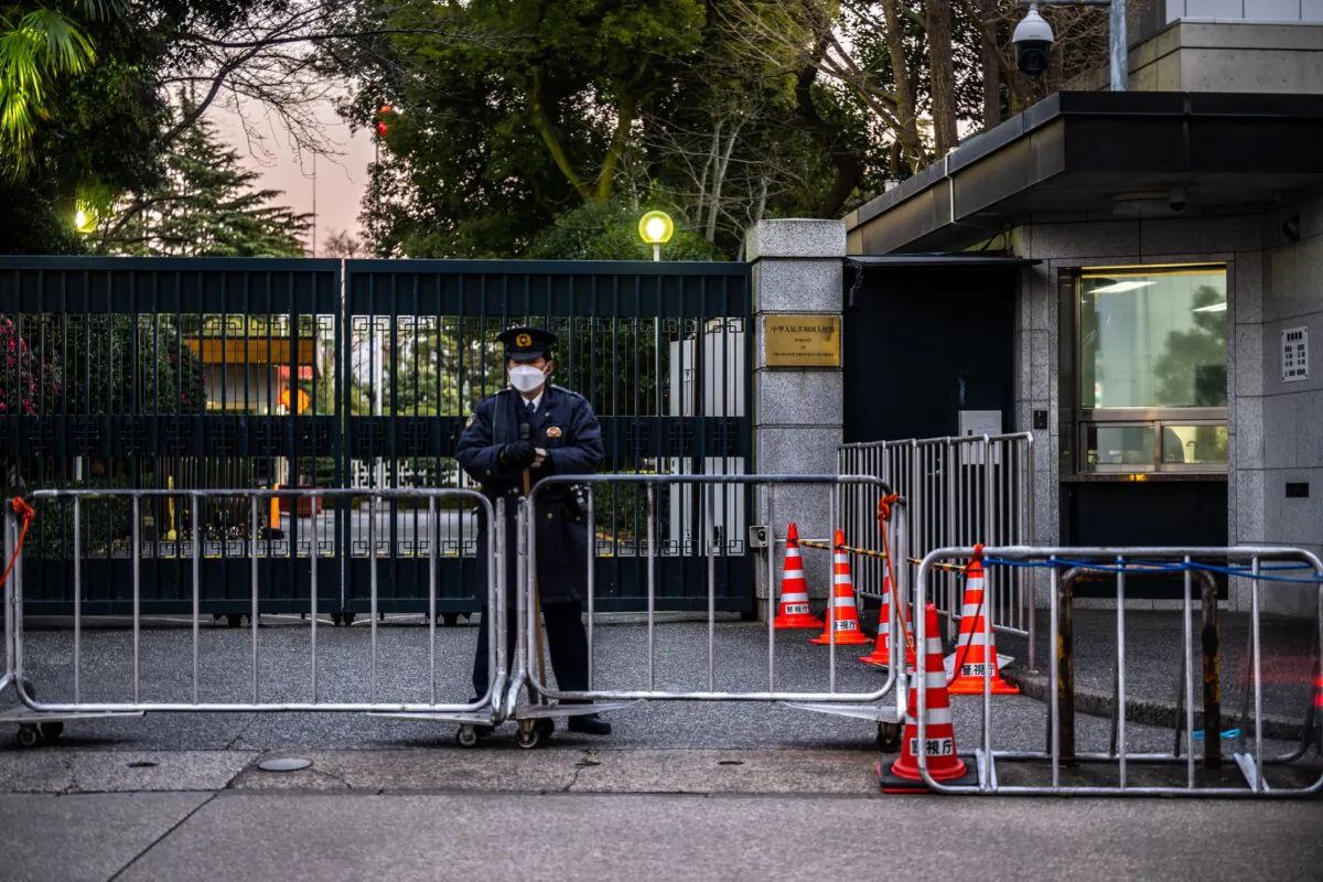 A police officer stands guard outside the Chinese Embassy in Tokyo on Jan. 10, 2023. (Philip Fong/AFP via Getty Images)