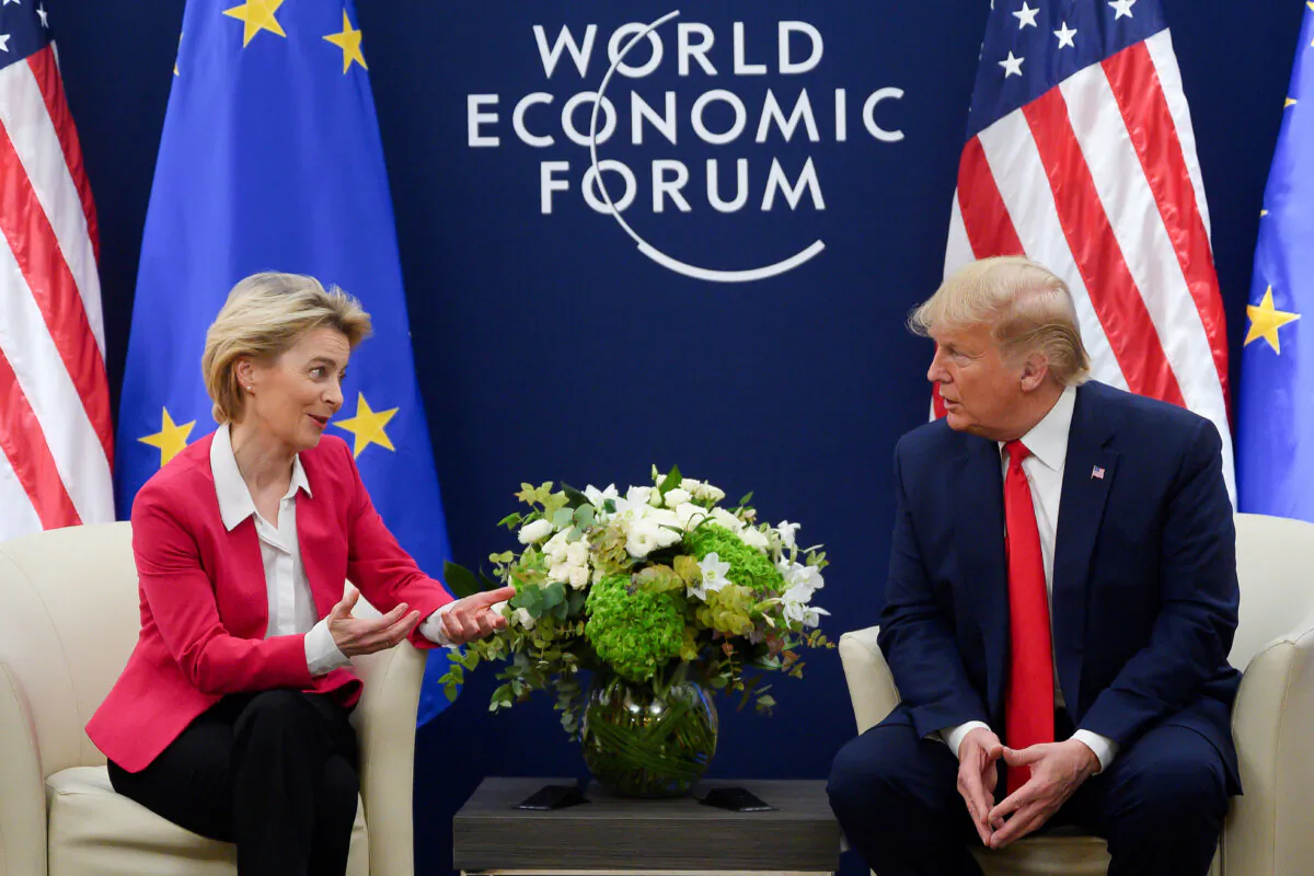 President Donald Trump speaks with European Commission President Ursula von der Leyen prior to their meeting at the World Economic Forum in Davos, on January 21, 2020. (Photo by JIM WATSON/AFP via Getty Images)