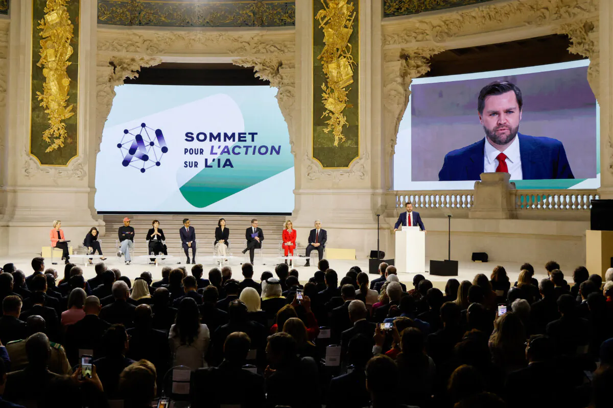 Vice President JD Vance (R) speaks during a plenary session at the AI summit in Paris on Feb. 11. (Ludovic Marin/AFP via Getty Images)