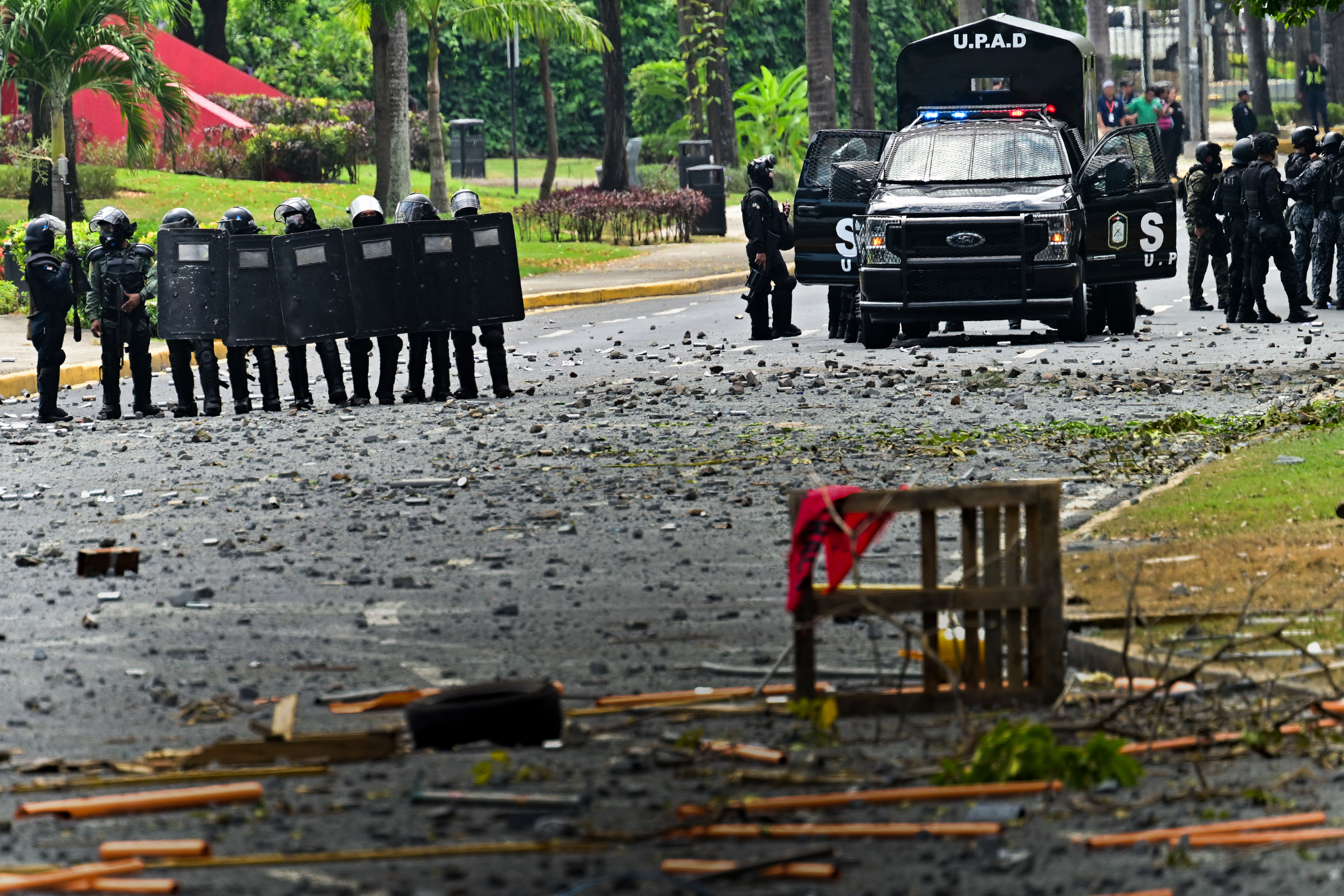 Day in Photos: Protests in Panama, Scientists Detect Neutrino, and Valentine’s Photo at the Zoo